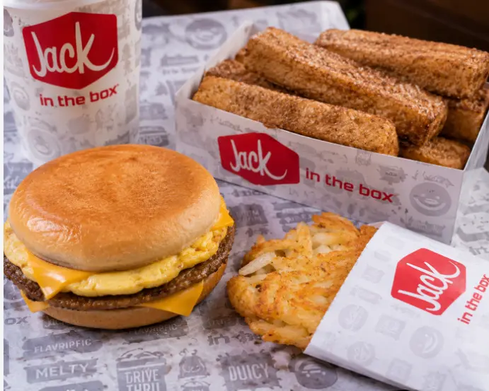 Jack in the Box breakfast spread — Breakfast Jack, hash browns, and French toast sticks